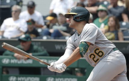 Jun 7, 2023; Pittsburgh, Pennsylvania, USA;  Oakland Athletics third baseman Jonah Bride (26) hits an RBI single against the Pittsburgh Pirates during the first inning at PNC Park. Mandatory Credit: Charles LeClaire-USA TODAY Sports