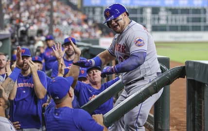 Jun 19, 2023; Houston, Texas, USA; New York Mets designated hitter Daniel Vogelbach (32) celebrates with teammates after hitting a home run during the third inning against the Houston Astros at Minute Maid Park. Mandatory Credit: Troy Taormina-USA TODAY Sports