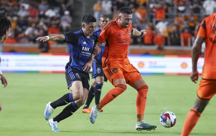 Jun 21, 2023; Houston, Texas, USA; Houston Dynamo FC midfielder Hector Herrera (16) attempts to control the ball as San Jose Earthquakes forward Cristian Espinoza (10) defends during the first half at Shell Energy Stadium. Mandatory Credit: Troy Taormina-USA TODAY Sports