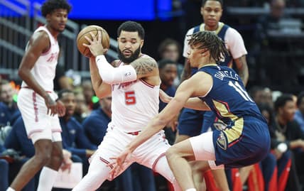 Nov 10, 2023; Houston, Texas, USA; Houston Rockets guard Fred VanVleet (5) controls the ball as New Orleans Pelicans guard Dyson Daniels (11) defends during the first quarter at Toyota Center. Mandatory Credit: Troy Taormina-USA TODAY Sports