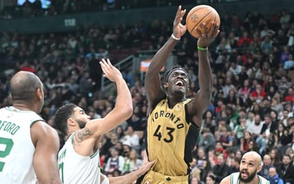 Nov 17, 2023; Toronto, Ontario, CAN;   Toronto Raptors forward Pascal Siakam (43) shoots the ball over Boston Celtics forward Jayson Tatum (0) in the second half at Scotiabank Arena. Mandatory Credit: Dan Hamilton-USA TODAY Sports