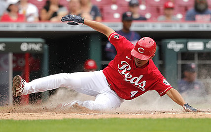 Aug 4, 2021; Cincinnati, Ohio, USA; Cincinnati Reds center fielder Shogo Akiyama (4) scores against the Minnesota Twins during the third inning at Great American Ball Park. Mandatory Credit: David Kohl-USA TODAY Sports
