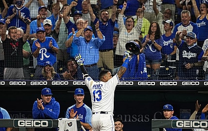 Sep 29, 2021; Kansas City, Missouri, USA; Kansas City Royals catcher Salvador Perez (13) celebrates after tying the franchise single season home run record during the first inning against the Cleveland Indians at Kauffman Stadium. Mandatory Credit: Jay Biggerstaff-USA TODAY Sports
