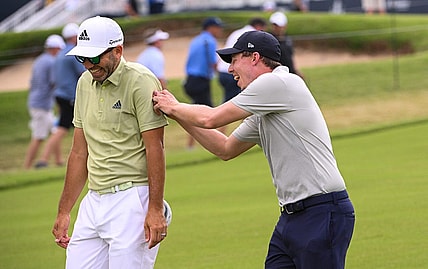 May 20, 2022; Tulsa, OK, USA;  Matthew Fitzpatrick and  Sergio Garcia walk down the first fairway during the second round of the PGA Championship golf tournament at Southern Hills Country Club. Mandatory Credit: Orlando Ramirez-USA TODAY Sports