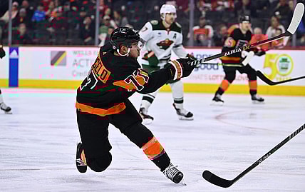 Mar 23, 2023; Philadelphia, Pennsylvania, USA; Philadelphia Flyers defenseman Tony DeAngelo (77) shoots against the Minnesota Wild in the third period at Wells Fargo Center. Mandatory Credit: Kyle Ross-USA TODAY Sports