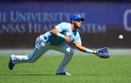 Sep 25, 2022; Kansas City, Missouri, USA; Kansas City Royals left fielder Edward Olivares (14) catches a line drive during the second inning against the Seattle Mariners at Kauffman Stadium. Mandatory Credit: Jay Biggerstaff-USA TODAY Sports