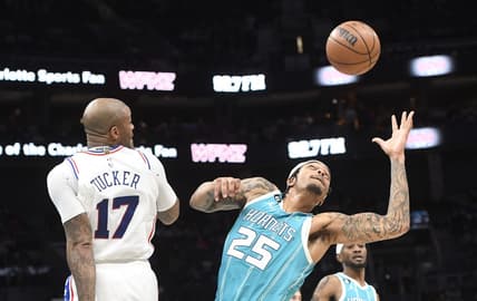 Nov 23, 2022; Charlotte, North Carolina, USA;  Charlotte Hornets forward P.J. Washington (25) gets a rebound during the first half against the Philadelphia 76ers at the Spectrum Center. Mandatory Credit: Sam Sharpe-USA TODAY Sports