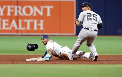 May 6, 2023; St. Petersburg, Florida, USA;  Tampa Bay Rays shortstop Wander Franco (5) steals second base as New York Yankees second baseman Gleyber Torres (25) attempted to tag him out during the fifth inning at Tropicana Field. Mandatory Credit: Kim Klement-USA TODAY Sports