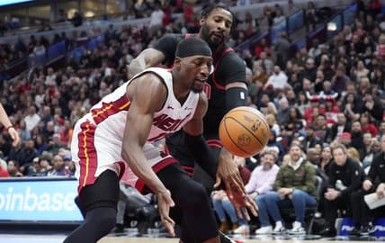Nov 18, 2023; Chicago, Illinois, USA; Chicago Bulls center Andre Drummond (3) defends Miami Heat center Bam Adebayo (13) during the first half at United Center. Mandatory Credit: David Banks-USA TODAY Sports
