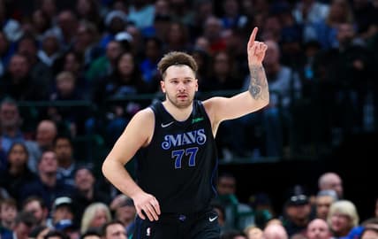 Dec 27, 2023; Dallas, Texas, USA;  Dallas Mavericks guard Luka Doncic (77) reacts after scoring during the first quarter against the Cleveland Cavaliers at American Airlines Center. Mandatory Credit: Kevin Jairaj-USA TODAY Sports