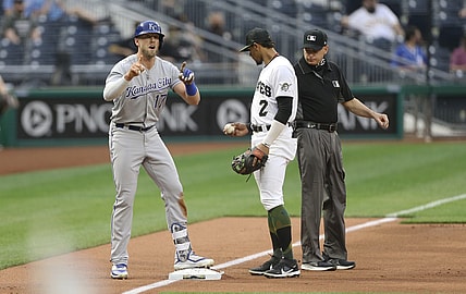 Apr 28, 2021; Pittsburgh, Pennsylvania, USA;  Kansas City Royals third baseman Hunter Dozier (17) reacts after hitting a two-run triple against the Pittsburgh Pirates during the first inning at PNC Park. Mandatory Credit: Charles LeClaire-USA TODAY Sports