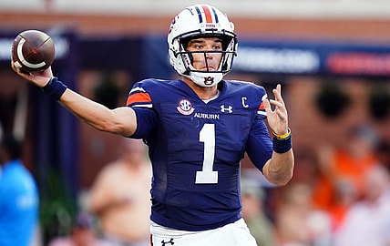 Oct 28, 2023; Auburn, Alabama, USA; Auburn Tigers quarterback Payton Thorne (1) rolls out to pass against the Mississippi State Bulldogs during the fourth quarter at Jordan-Hare Stadium. Mandatory Credit: John David Mercer-USA TODAY Sports