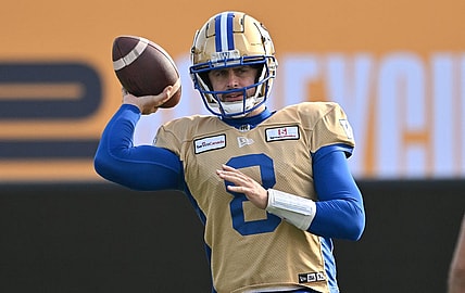 Nov 16, 2023; Hamilton, Ontario, CAN;  Winnipeg Blue Bombers quarterback Zach Collaros (8) throws a pass during practice at Tim Hortons Field. Mandatory Credit: Dan Hamilton-USA TODAY Sports