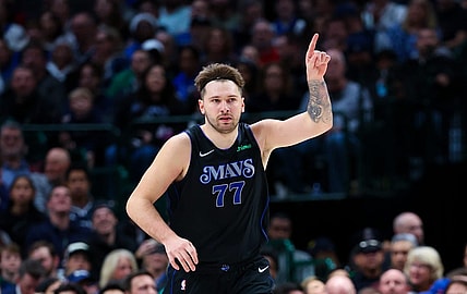 Dec 27, 2023; Dallas, Texas, USA;  Dallas Mavericks guard Luka Doncic (77) reacts after scoring during the first quarter against the Cleveland Cavaliers at American Airlines Center. Mandatory Credit: Kevin Jairaj-USA TODAY Sports