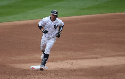 Apr 1, 2021; Bronx, New York, USA; New York Yankees catcher Gary Sanchez (24) rounds the bases after hitting a two run home run against the Toronto Blue Jays during the second inning of an opening day game at Yankee Stadium. Mandatory Credit: Brad Penner-USA TODAY Sports