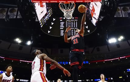 Nov 18, 2023; Chicago, Illinois, USA; Miami Heat center Bam Adebayo (13) defends Chicago Bulls forward DeMar DeRozan (11) during the second half at United Center. Mandatory Credit: David Banks-USA TODAY Sports