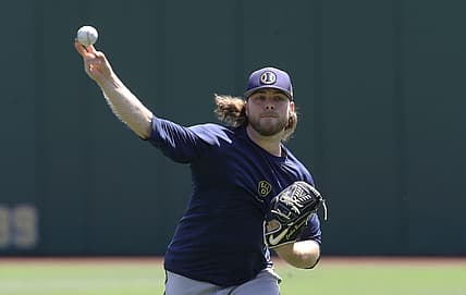 Jul 3, 2022; Pittsburgh, Pennsylvania, USA;  Milwaukee Brewers pitcher Corbin Burnes (39) throws in the outfield before the game against the Pittsburgh Pirates at PNC Park. Mandatory Credit: Charles LeClaire-USA TODAY Sports