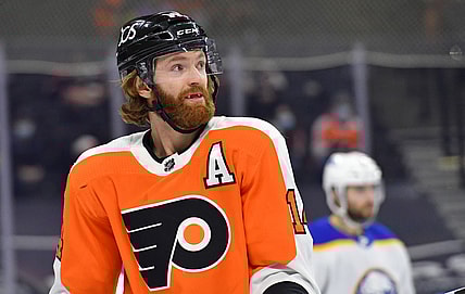 Mar 9, 2021; Philadelphia, Pennsylvania, USA; Philadelphia Flyers center Sean Couturier (14) against the Buffalo Sabres during the third period at Wells Fargo Center. Mandatory Credit: Eric Hartline-USA TODAY Sports
