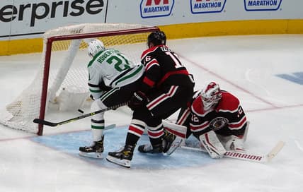 Apr 8, 2021; Chicago, Illinois, USA; Dallas Stars left wing Jason Robertson (21) scores a goal on Chicago Blackhawks goaltender Kevin Lankinen (32) during the second period at United Center. Mandatory Credit: David Banks-USA TODAY Sports
