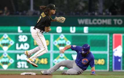 Sep 28, 2021; Pittsburgh, Pennsylvania, USA;  Pittsburgh Pirates second baseman Cole Tucker (3) avoids the slide of Chicago Cubs right fielder Nick Martini (62) after throwing to first base to complete a double pay during the second inning at PNC Park. Mandatory Credit: Charles LeClaire-USA TODAY Sports