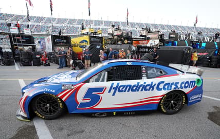 Feb 18, 2022; Daytona Beach, Florida, USA; NASCAR Cup Series driver Kyle Larson (5) leaves the garage area during practice for the Daytona 500 at Daytona International Speedway. Mandatory Credit: John David Mercer-USA TODAY Sports