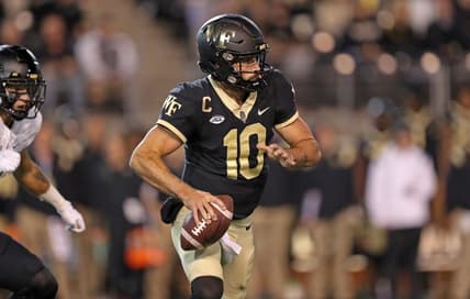 Oct 8, 2022; Winston-Salem, North Carolina, USA; Wake Forest Demon Deacons quarterback Sam Hartman (10) looks to pass against the Army Black Knights during the first half at Truist Field. Mandatory Credit: Danny Wild-USA TODAY Sports