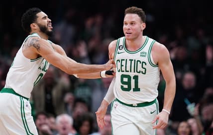 Feb 8, 2023; Boston, Massachusetts, USA; Boston Celtics forward Jayson Tatum (0) reacts after forward Blake Griffin (91) makes a three point basket against the Philadelphia 76ers in the second half at TD Garden. Mandatory Credit: David Butler II-USA TODAY Sports