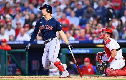 May 6, 2023; Philadelphia, Pennsylvania, USA; Boston Red Sox outfielder Rob Refsnyder (30) hits a single against the Philadelphia Phillies in the fourth inning at Citizens Bank Park. Mandatory Credit: Kyle Ross-USA TODAY Sports