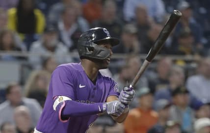 May 9, 2023; Pittsburgh, Pennsylvania, USA;  Colorado Rockies left fielder Jurickson Profar (29) hits a two run home run against the Pittsburgh Pirates during the seventh inning at PNC Park. Mandatory Credit: Charles LeClaire-USA TODAY Sports