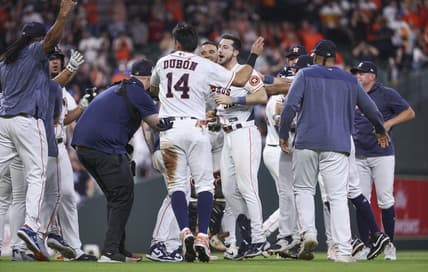 May 17, 2023; Houston, Texas, USA; Houston Astros designated hitter Kyle Tucker (30) celebrates with teammates after hitting a game-winning walk-off single during the ninth inning against the Chicago Cubs at Minute Maid Park. Mandatory Credit: Troy Taormina-USA TODAY Sports