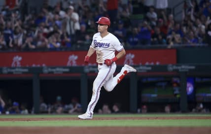Jun 6, 2023; Arlington, Texas, USA; Texas Rangers first baseman Nathaniel Lowe (30) runs the bases after hitting a home run during the third inning against the St. Louis Cardinals at Globe Life Field. Mandatory Credit: Kevin Jairaj-USA TODAY Sports