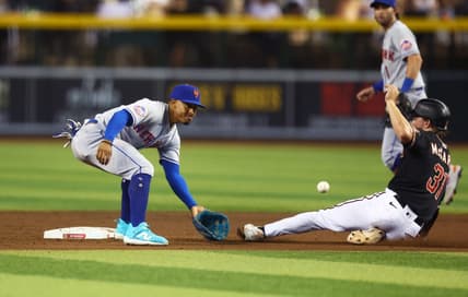 Jul 5, 2023; Phoenix, Arizona, USA; Arizona Diamondbacks base runner Jake McCarthy (right) steals second ahead of the tag from New York Mets shortstop Francisco Lindor in the fifth inning at Chase Field. Mandatory Credit: Mark J. Rebilas-USA TODAY Sports
