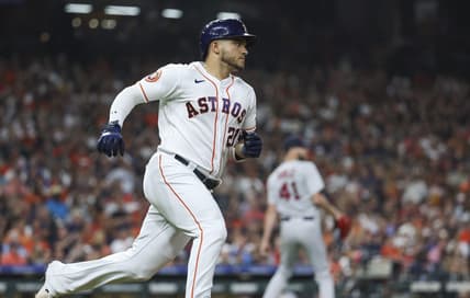 Aug 23, 2023; Houston, Texas, USA; Boston Red Sox starting pitcher Chris Sale (41) reacts and Houston Astros designated hitter Yainer Diaz (21) runs to first base after hitting a single during the third inning at Minute Maid Park. Mandatory Credit: Troy Taormina-USA TODAY Sports