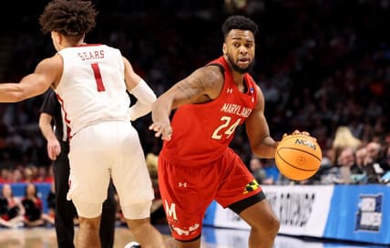 Mar 18, 2023; Birmingham, AL, USA; Maryland Terrapins forward Donta Scott (24) drives past Alabama Crimson Tide guard Mark Sears (1) during the first half at Legacy Arena. Mandatory Credit: Vasha Hunt-USA TODAY Sports