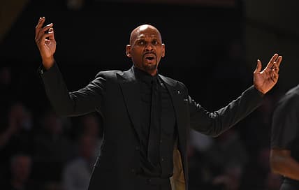 Mar 1, 2022; Nashville, Tennessee, USA; Vanderbilt Commodores head coach Jerry Stackhouse reacts from the bench during the second half against the Florida Gators at Memorial Gymnasium. Mandatory Credit: Christopher Hanewinckel-USA TODAY Sports
