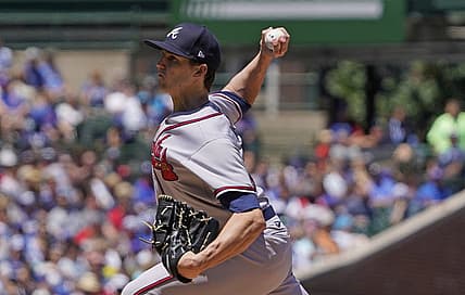 Jun 18, 2022; Chicago, Illinois, USA; Atlanta Braves starting pitcher Kyle Wright (30) throws the ball against the Chicago Cubs during the first inning at Wrigley Field. Mandatory Credit: David Banks-USA TODAY Sports