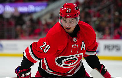 Nov 26, 2023; Raleigh, North Carolina, USA; Carolina Hurricanes center Sebastian Aho (20) looks on during the third period against the Columbus Blue Jackets at PNC Arena. Mandatory Credit: James Guillory-USA TODAY Sports