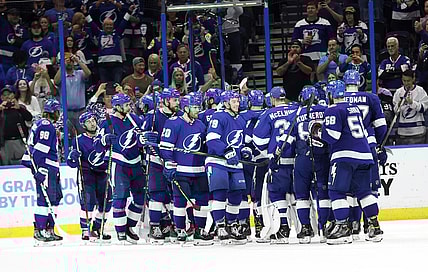 May 26, 2021; Tampa, Florida, USA;Tampa Bay Lightning right wing Barclay Goodrow (19) and teammates  celebrate as they beat the Florida Panthers during game six of the first round of the 2021 Stanley Cup Playoffs at Amalie Arena. Mandatory Credit: Kim Klement-USA TODAY Sports