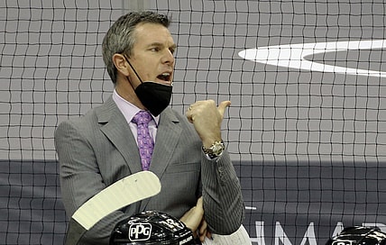 Mar 29, 2021; Pittsburgh, Pennsylvania, USA;  Pittsburgh Penguins head coach Mike Sullivan reacts on the bench against the New York Islanders during the third period at PPG Paints Arena. Pittsburgh won 2-1 Mandatory Credit: Charles LeClaire-USA TODAY Sports