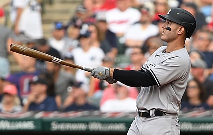 Jul 2, 2022; Cleveland, Ohio, USA; New York Yankees first baseman Anthony Rizzo (48) hits a home run during the fourth inning against the Cleveland Guardians at Progressive Field. Mandatory Credit: Ken Blaze-USA TODAY Sports