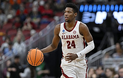 Mar 24, 2023; Louisville, KY, USA; Alabama Crimson Tide forward Brandon Miller (24) dribbles during the second half of the NCAA tournament round of sixteen against the San Diego State Aztecs at KFC YUM! Center. Mandatory Credit: Jamie Rhodes-USA TODAY Sports