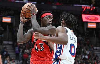 Oct 28, 2023; Toronto, Ontario, CAN;  Toronto Raptors forward Pascal Siakam (43) looks to make a pass as Philadelphia 76ers guard Tyrese Maxey (0) defends in the second half at Scotiabank Arena. Mandatory Credit: Dan Hamilton-USA TODAY Sports