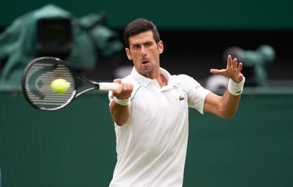 Jun 28, 2021; London, United Kingdom;  Novak Djokovic (SRB) seen playing against Jack Draper (GBR) on the centre court in the first round at All England Lawn Tennis and Croquet Club. Mandatory Credit: Peter van den Berg-USA TODAY Sports