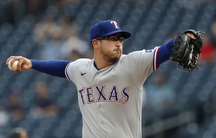 May 22, 2023; Pittsburgh, Pennsylvania, USA;  Texas Rangers starting pitcher Dane Dunning (33) delivers a pitch against the Pittsburgh Pirates during the first inning at PNC Park. Mandatory Credit: Charles LeClaire-USA TODAY Sports