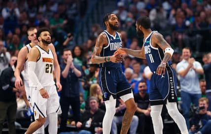 Mar 17, 2024; Dallas, Texas, USA;  Dallas Mavericks forward Derrick Jones Jr. (55) celebrates with Dallas Mavericks guard Kyrie Irving (11) in front of Denver Nuggets guard Jamal Murray (27) during the first quarter at American Airlines Center. Mandatory Credit: Kevin Jairaj-USA TODAY Sports