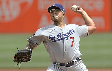 Jun 10, 2021; Pittsburgh, Pennsylvania, USA;  Los Angeles Dodgers starting pitcher Julio Urias (7) delivers a pitch against the Pittsburgh Pirates during the first inning at PNC Park. Mandatory Credit: Charles LeClaire-USA TODAY Sports