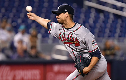 Aug 18, 2021; Miami, Florida, USA; Atlanta Braves starting pitcher Charlie Morton (50) pitches against the Miami Marlins during the first inning at loanDepot Park. Mandatory Credit: Jim Rassol-USA TODAY Sports