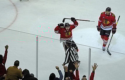 Nov 1, 2021; Chicago, Illinois, USA; Chicago Blackhawks left wing Brandon Hagel (38) celebrates his goal against the Ottawa Senators during the first period at United Center. Mandatory Credit: David Banks-USA TODAY Sports