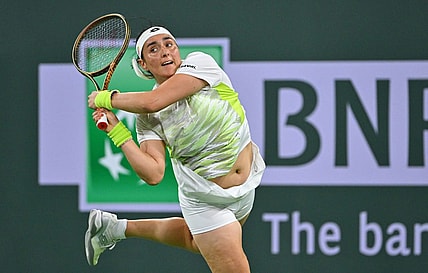 Mar 11, 2023; Indian Wells, CA, USA;  Ons Jabeur (TUN) hits a shot during her second round match against Magdalena Frech (POL) in the BNP Paribas Open at the Indian Wells Tennis Garden. Mandatory Credit: Jayne Kamin-Oncea-USA TODAY Sports