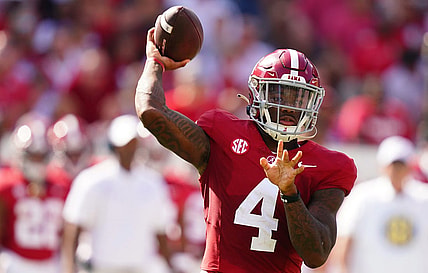 Sep 23, 2023; Tuscaloosa, Alabama, USA; Alabama Crimson Tide quarterback Jalen Milroe (4) looks to pass against the Mississippi Rebels during the first quarter at Bryant-Denny Stadium. Mandatory Credit: John David Mercer-USA TODAY Sports